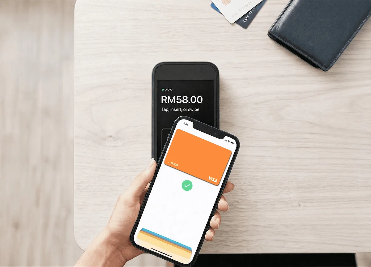 Customer paying with their phone via the StoreHub Pay terminal